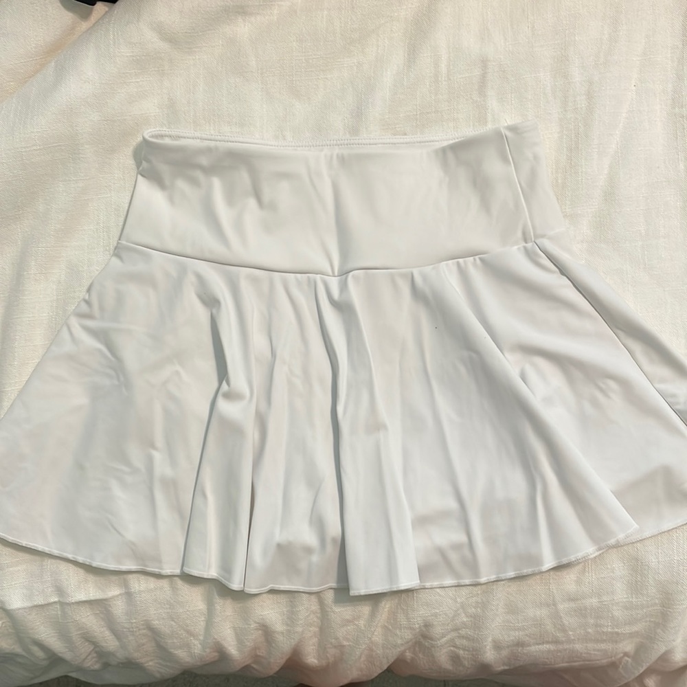 Halara ruffle tennis skirt! Has built in shorts with phone pocket!
